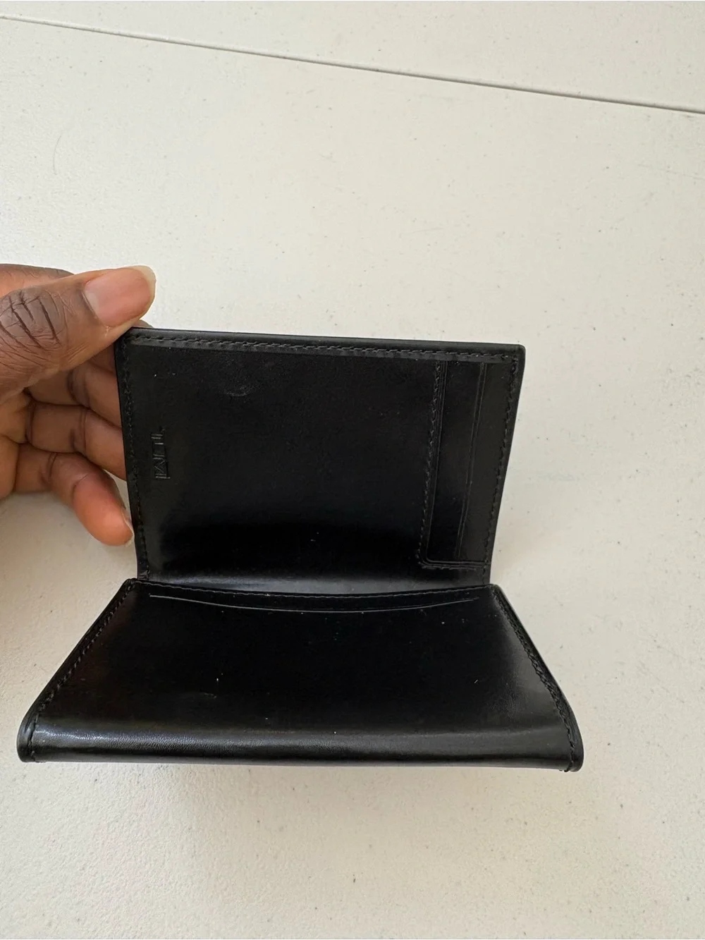 Tumi genuine leather